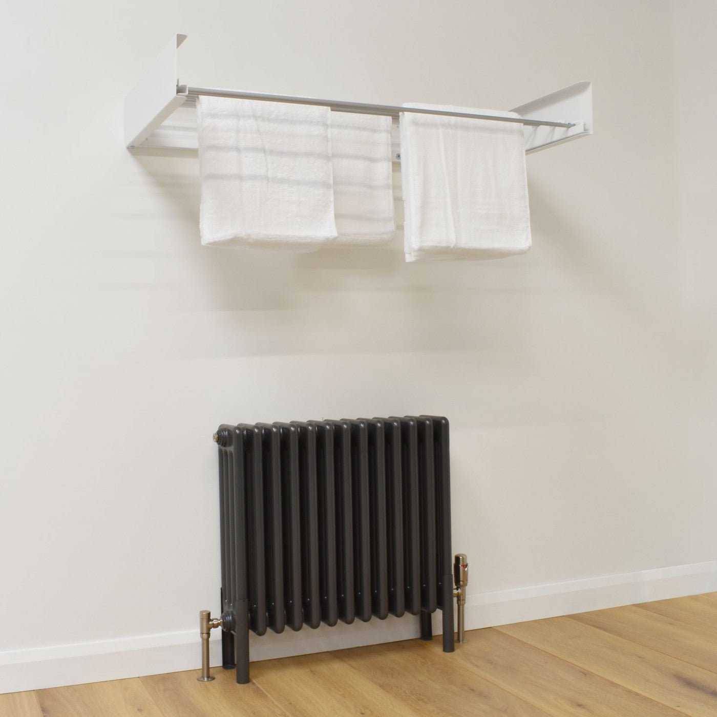 Plumbers Choice Foldable Wall Mounted Towel Hanger 700mm Wide - White