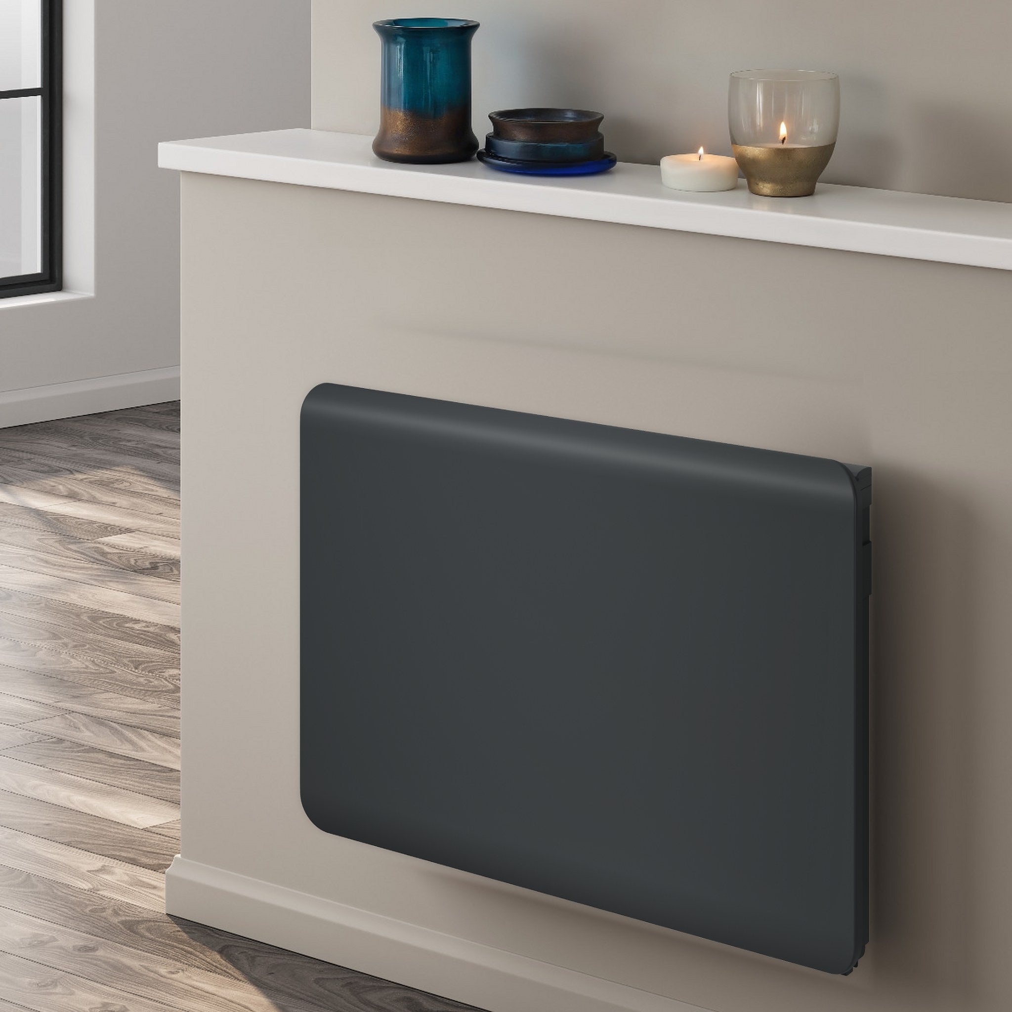 Reina Odet electric radiator 500mm x 820mm in Anthracite in a living space